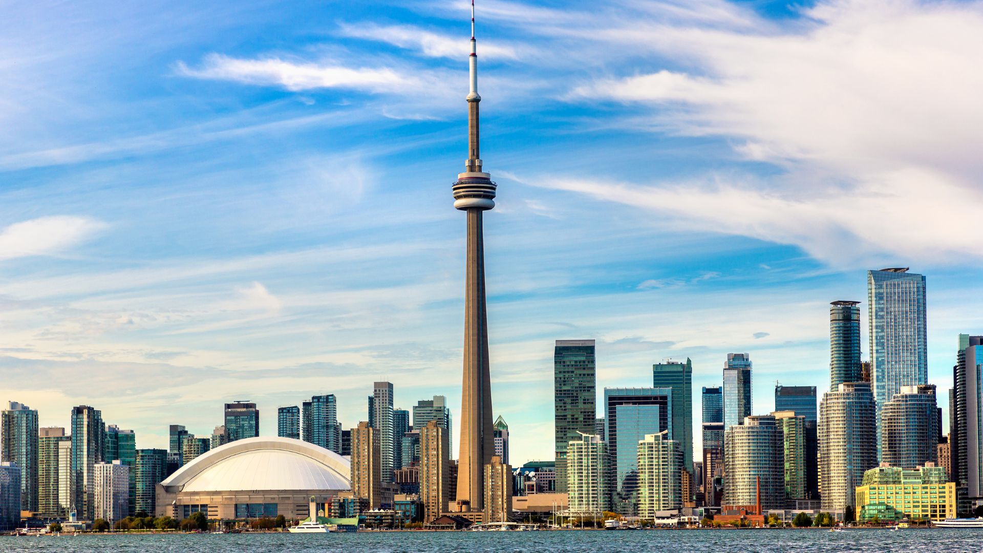 A view of the Toronto city skyline from the water.
