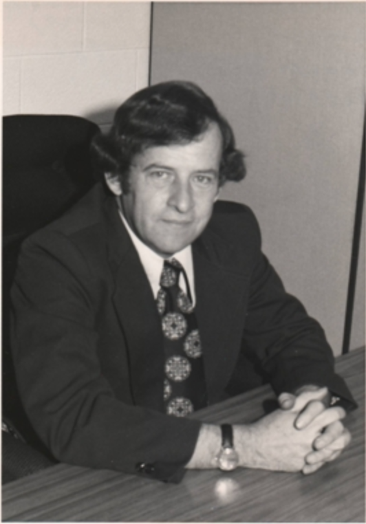 Jim Turner sitting at a desk