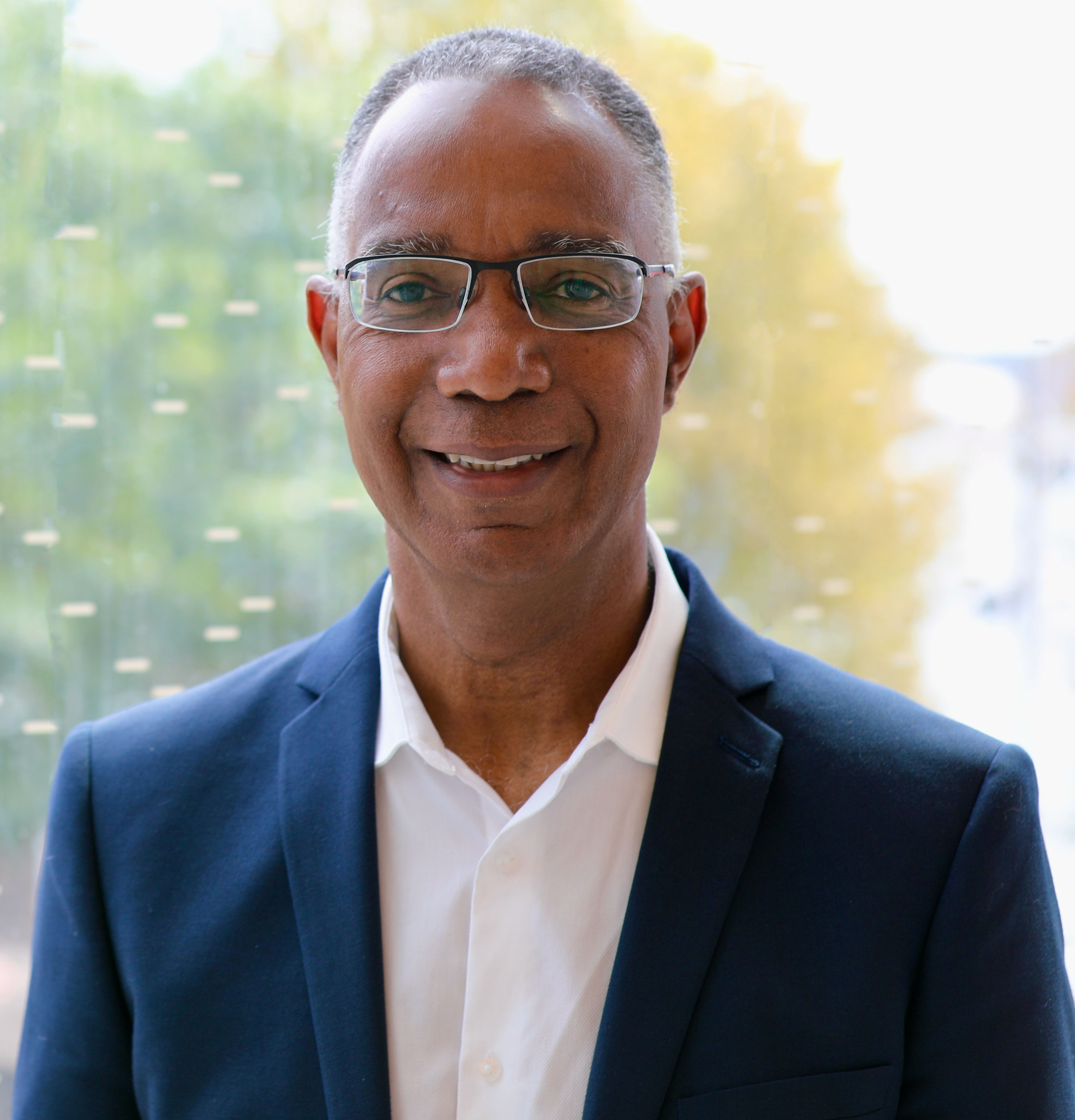 a photo of president Dr. Gervan Fearon