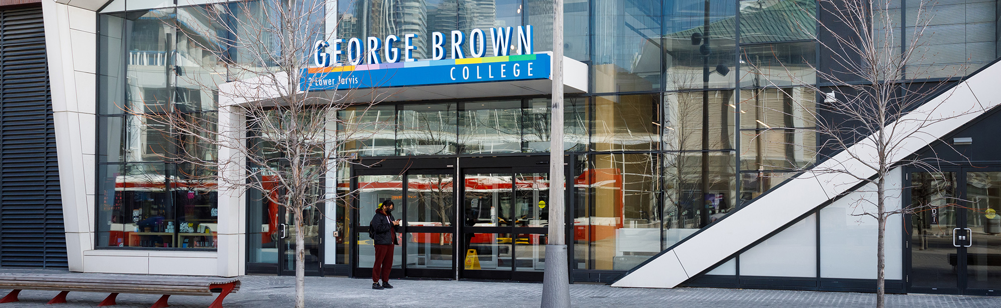 Person standing outside of School of Design building at 3 Lower Jarvis