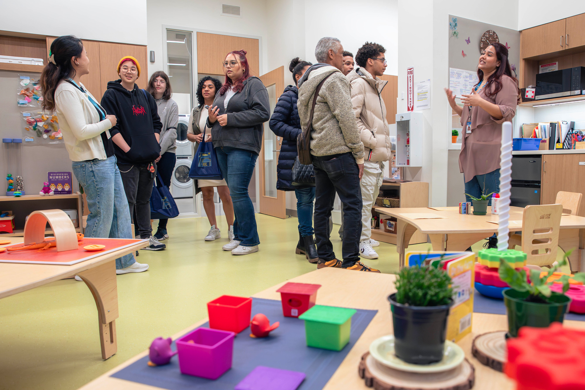 Students take a tour of the new Mary's Place child care centre at Limberlost Place