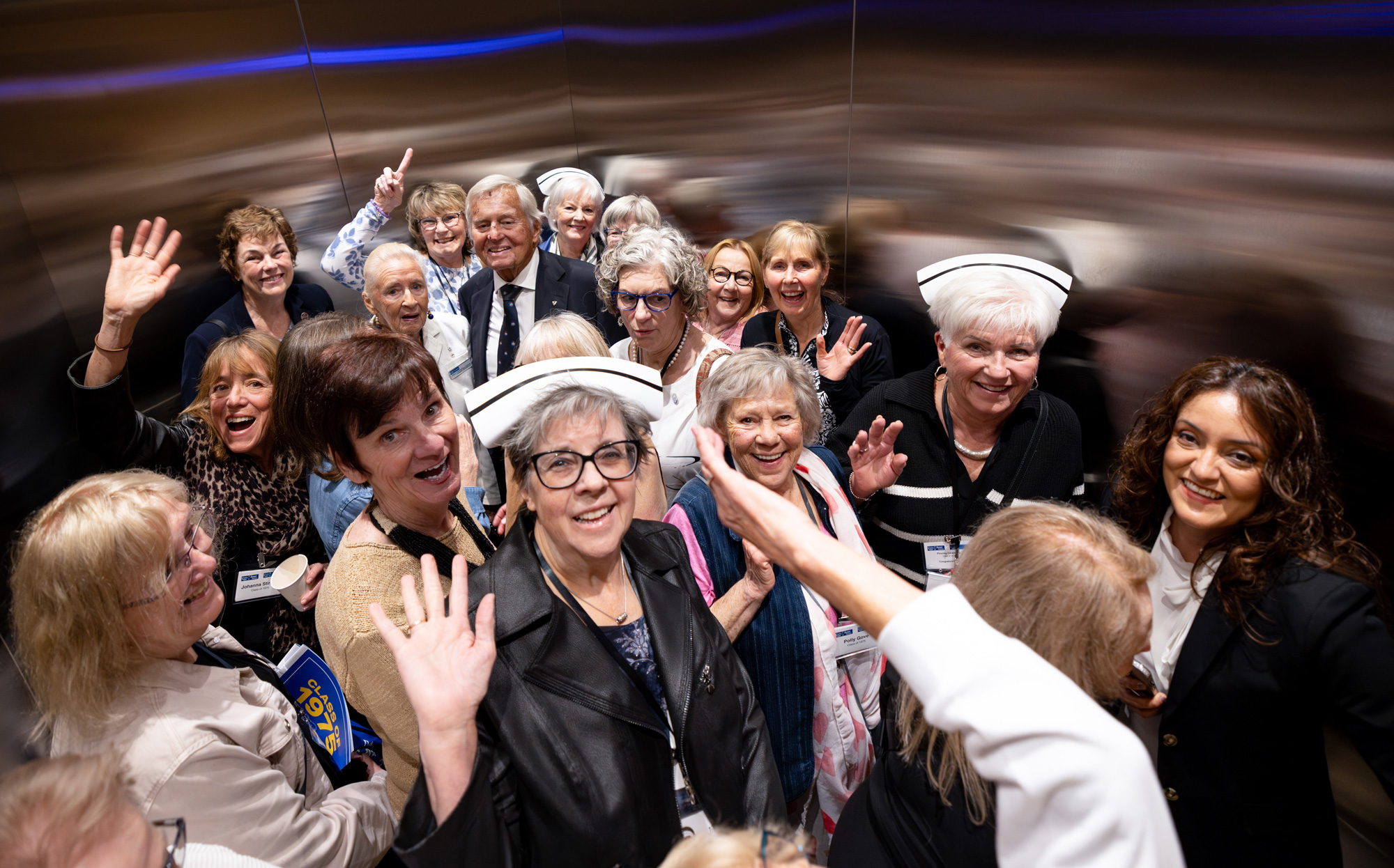The nursing class of 1975 together in an elevator as they tour George Brown facilities