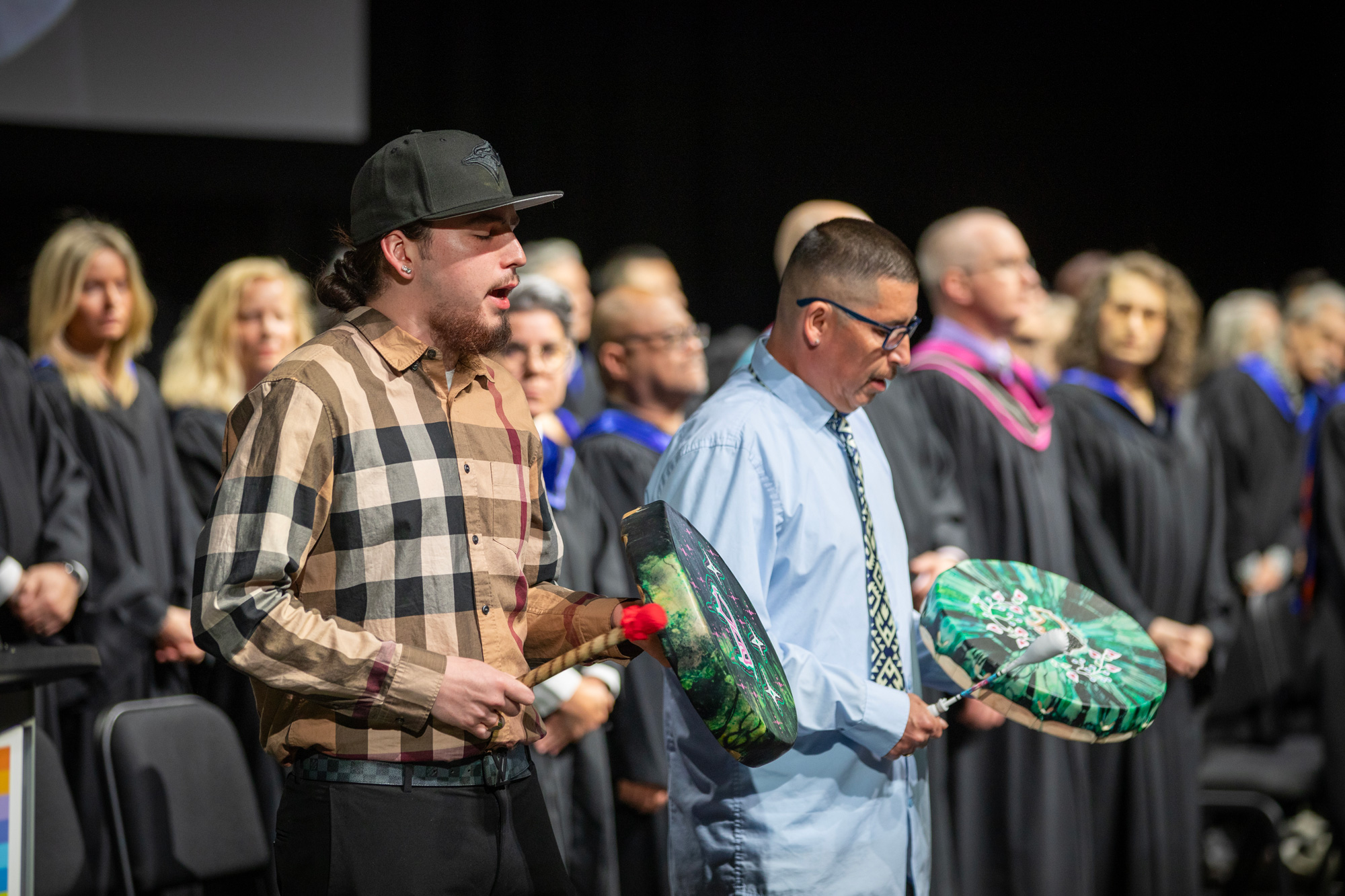 Indigenous drummers play an honour song at the beginning of the 2025 convocation ceremonies