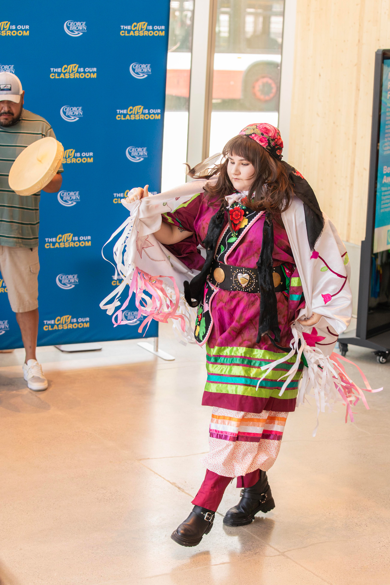 An women from the Mississaugas of the Credit First Nation dances the traditional women's dance