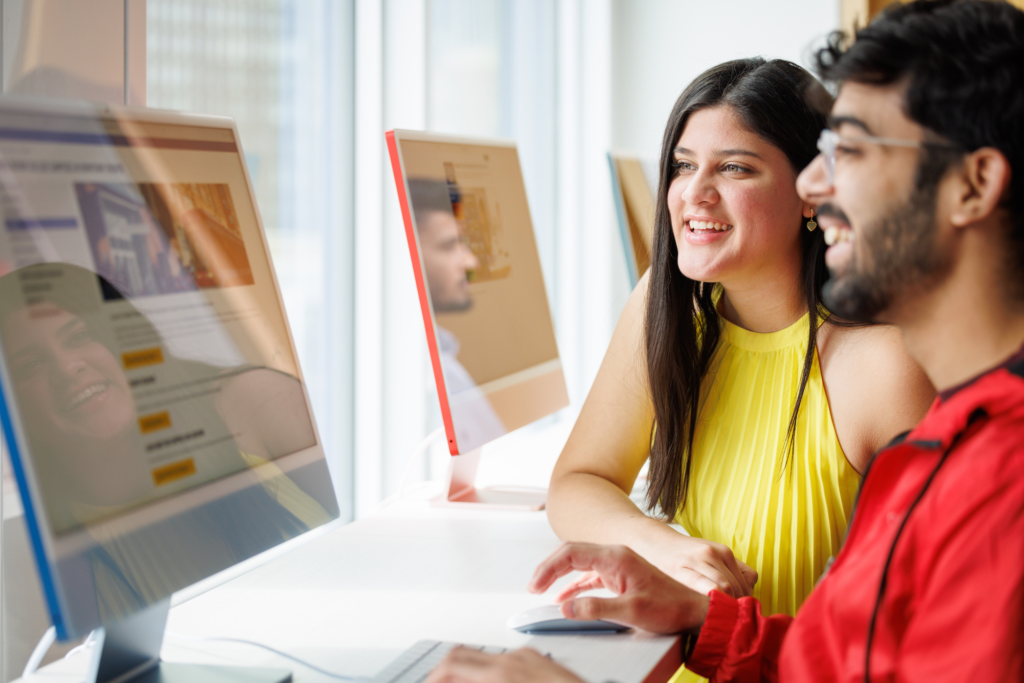 Students study together in a George Brown Polytechnic computer lab.