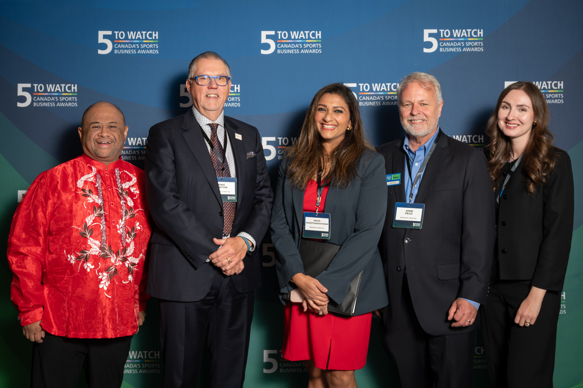 Co-chairs and organizing committee members of 5 to Watch pose at the 2025 awards reception