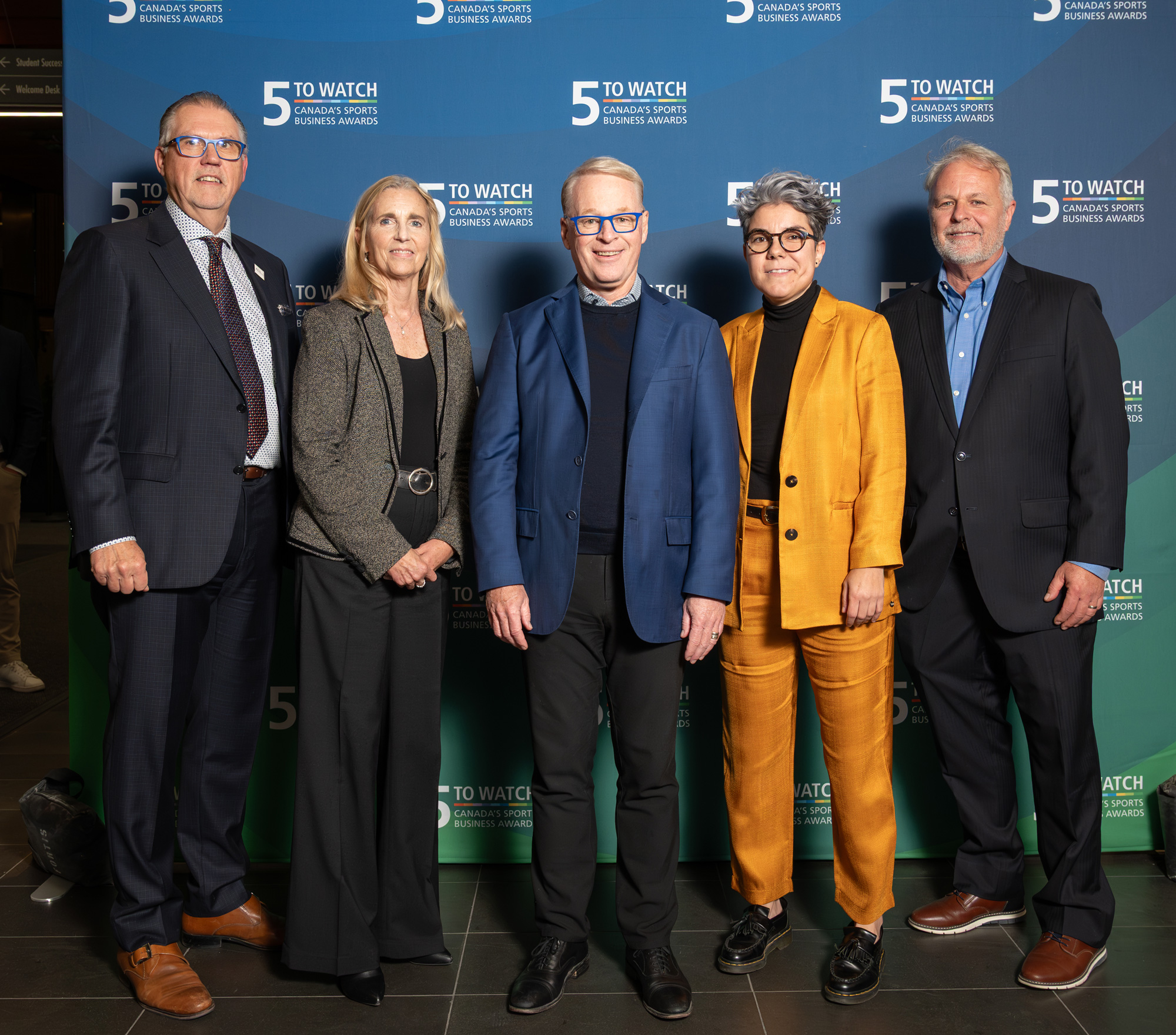 Staff pose with lifetime achievement winner, Keith Pelley, at the 5 to Watch reception