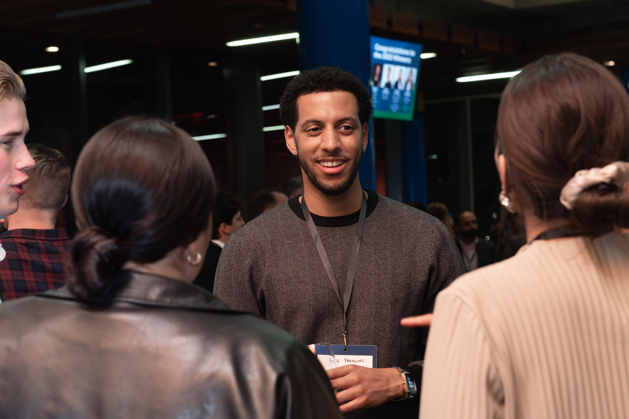 Guests chat at the 5 to Watch reception