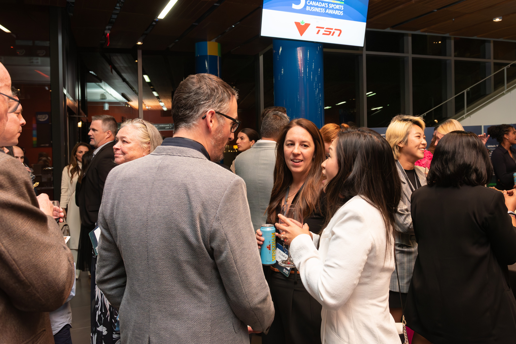 Guests at the 5 to Watch reception connect with peers