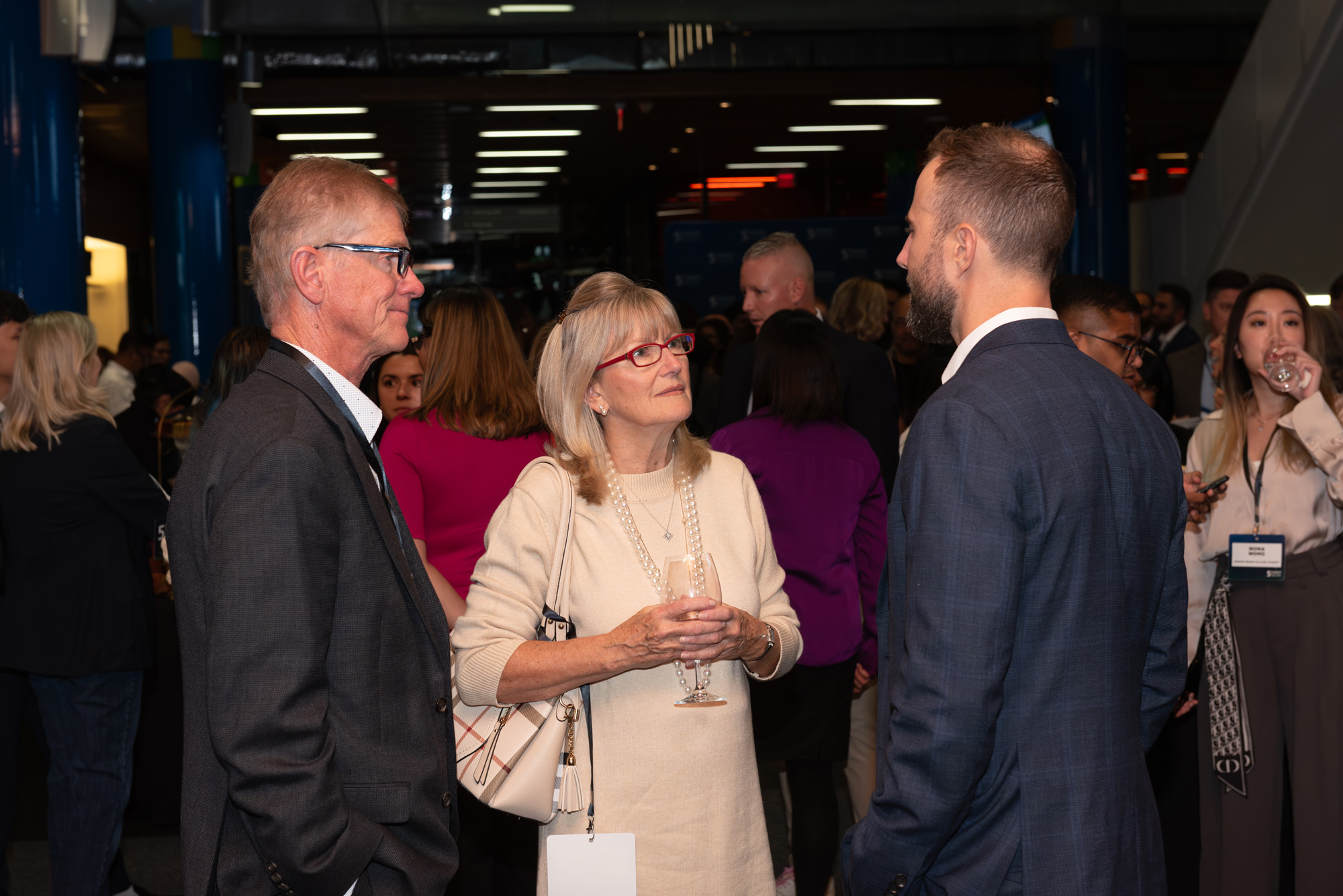 Guests chat at the 5 to Watch reception