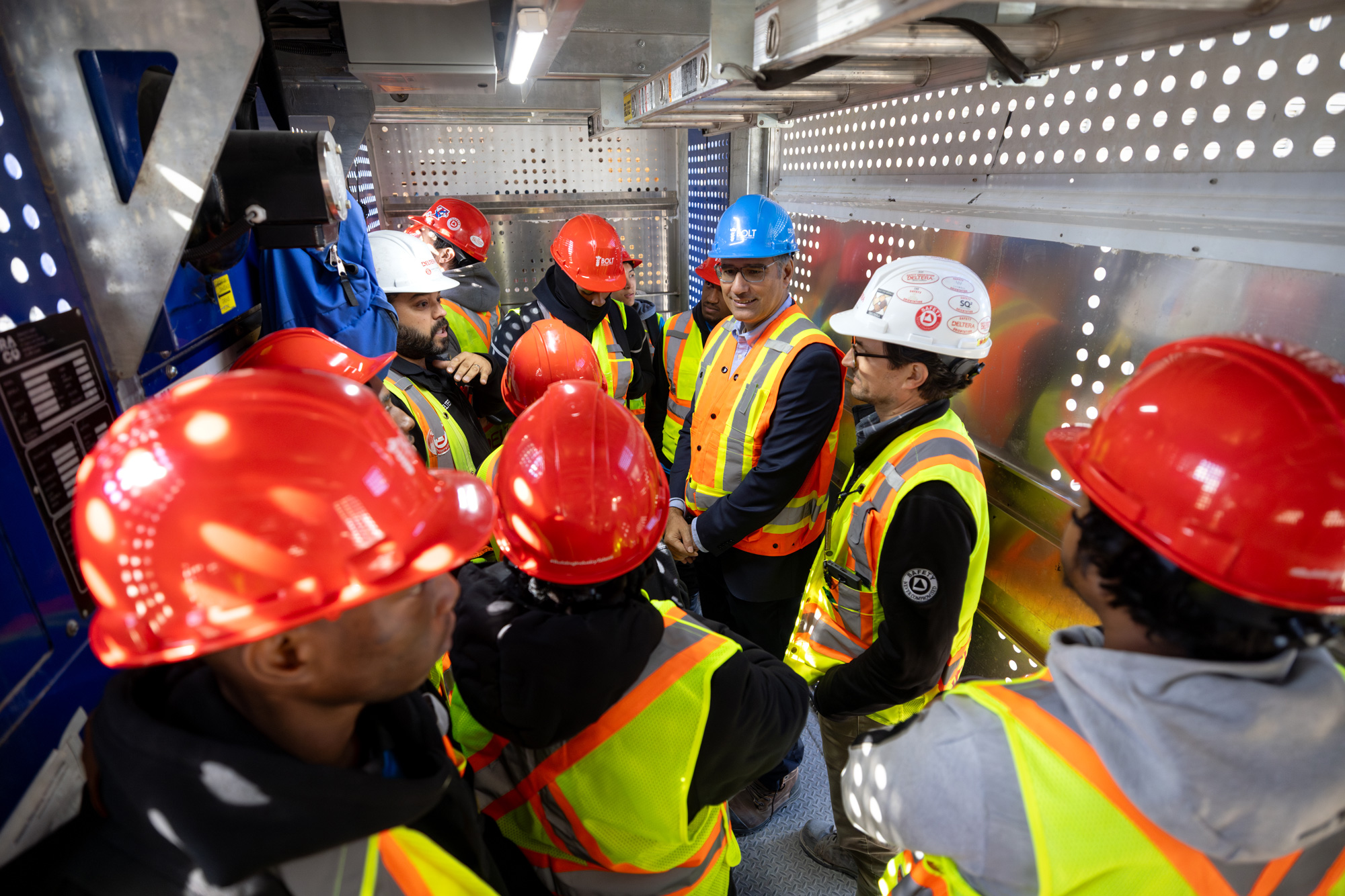 Members from Tridel take students through a construction site