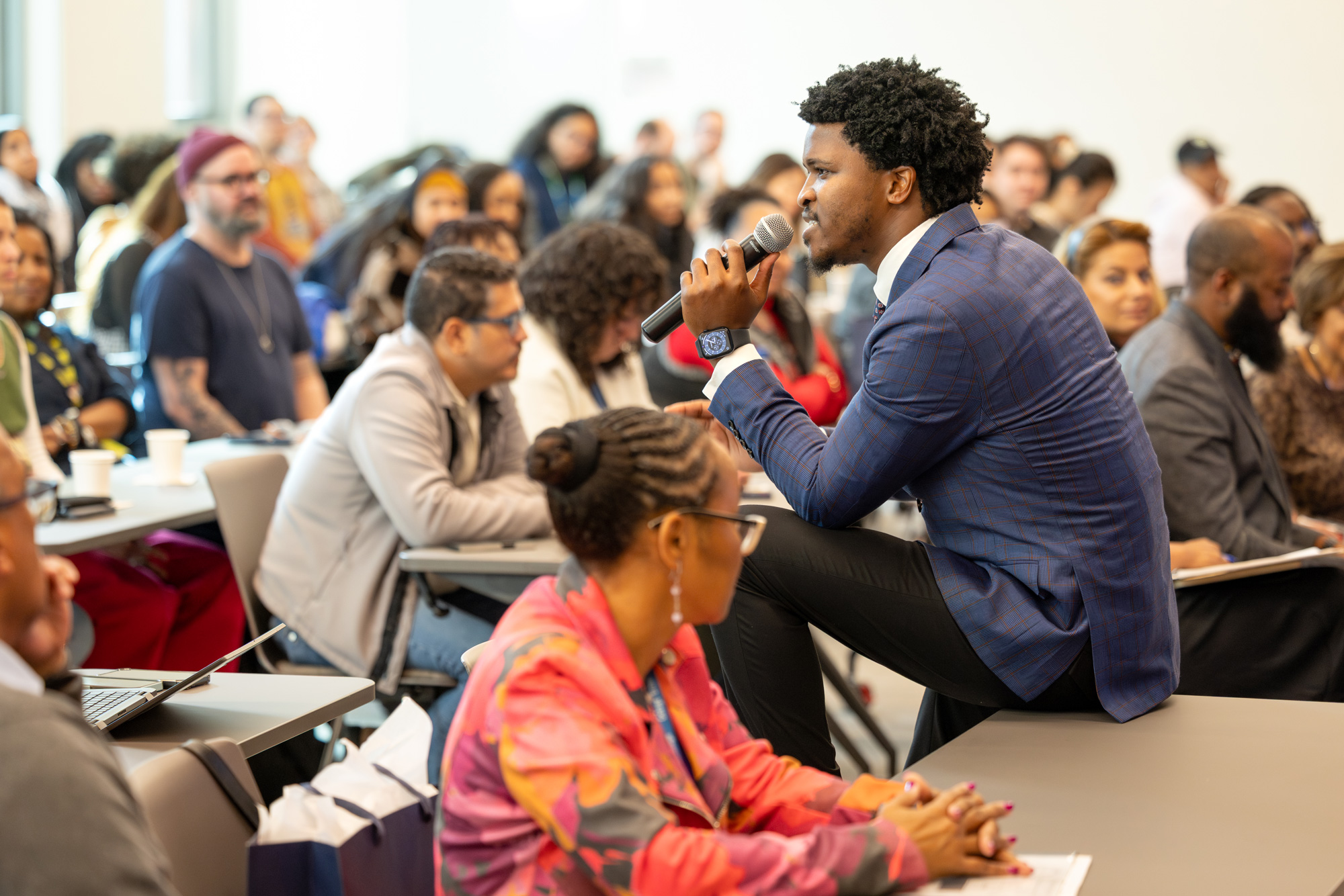 Dr. Siyabulela Mandela sits amongst guests for his talk at George Brown
