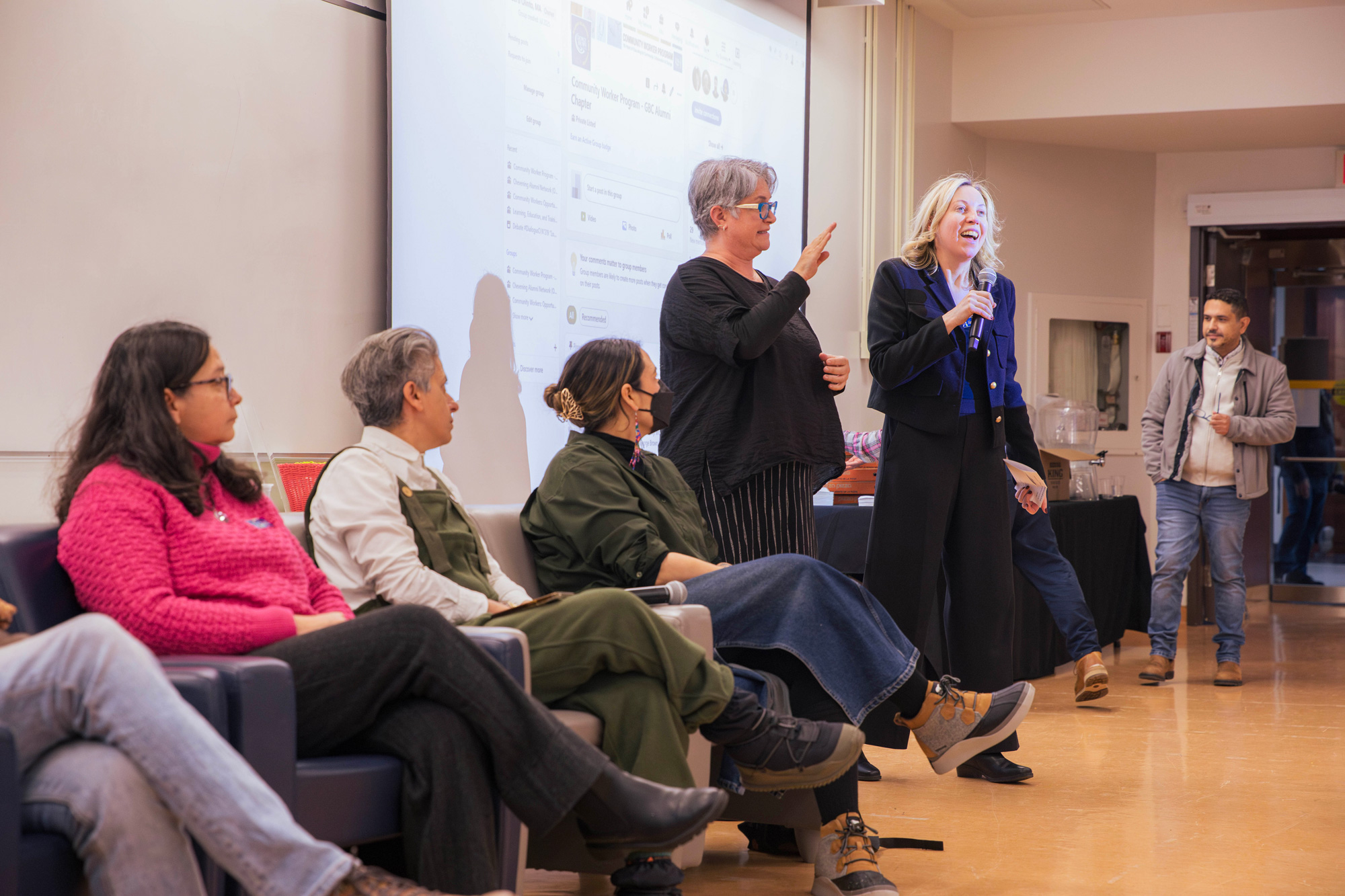 Carmel Drumgoole announces the launch of the Community Worker alumni chapter at the Human Rights Day panel