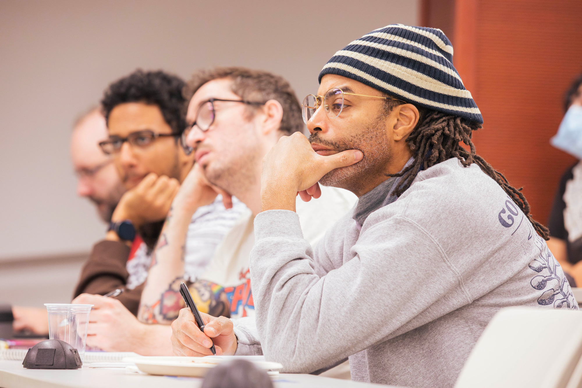 Guests in the audience listen to panelists at the Human Rights Day panel