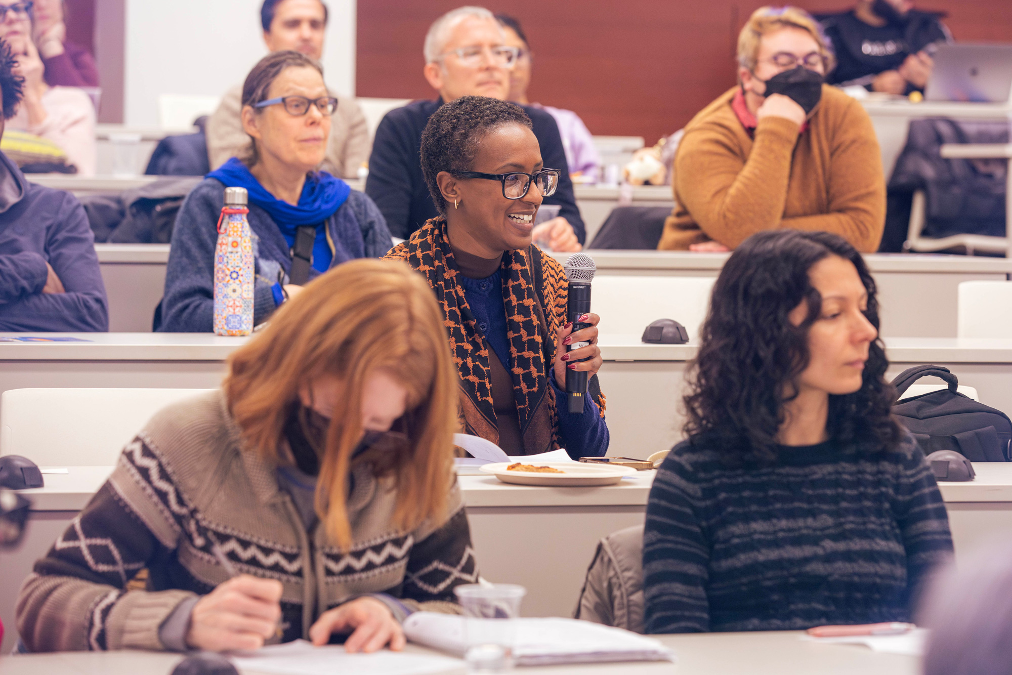 Guests in the audience listen to panelists at the Human Rights Day panel