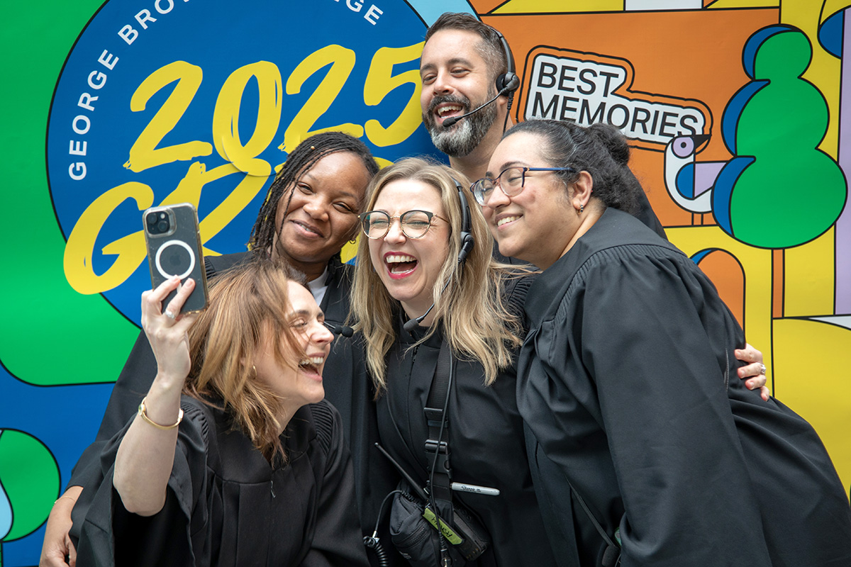 5 employees taking a selfie at 2025 convocation