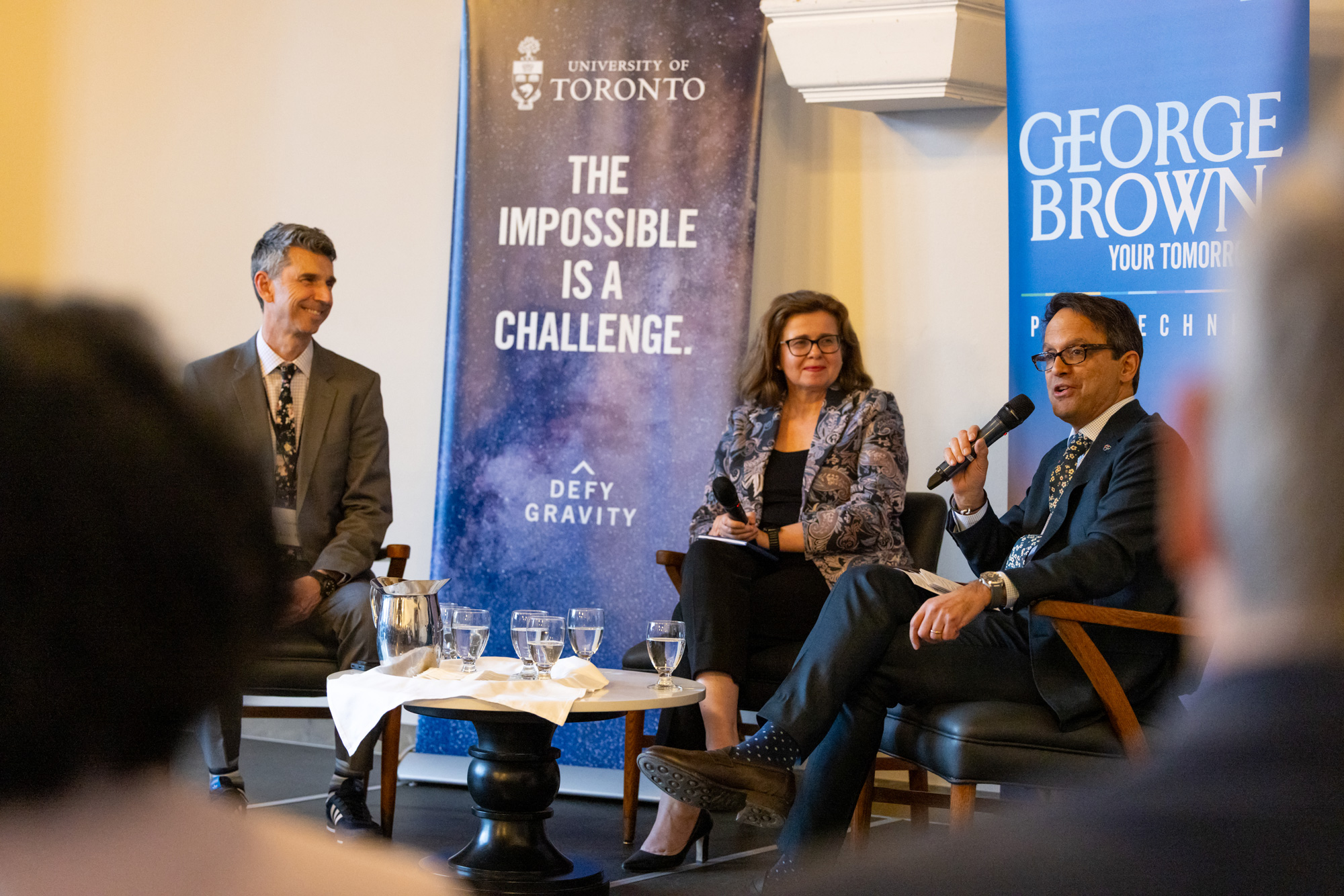 Robert Luke, Dr. Claudie Krywiak, and Daniel Tisch at the MOU signing event