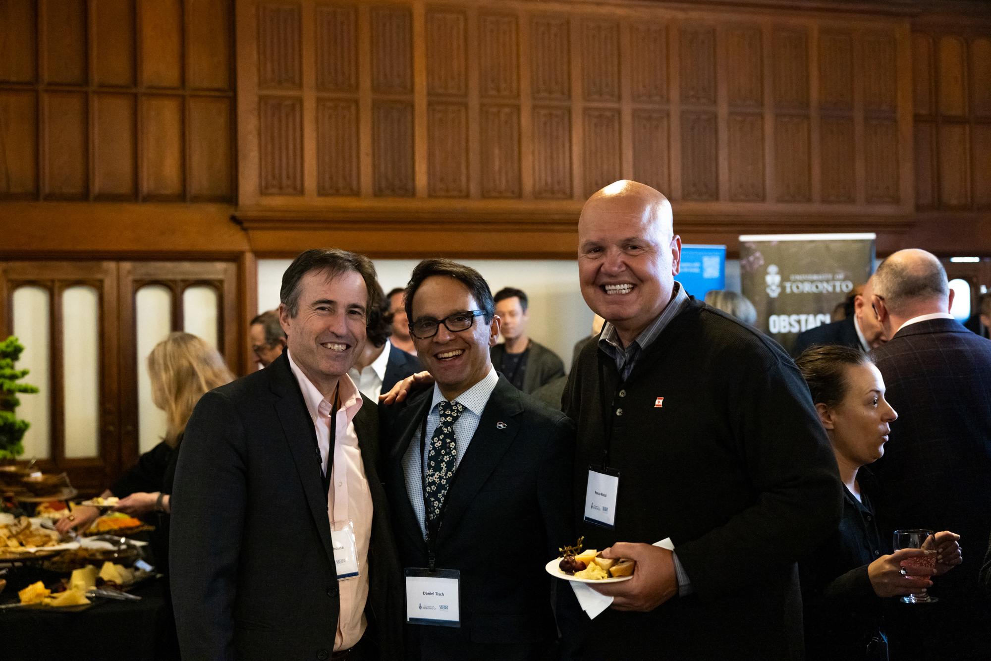 Education and industry leaders chat the signing event at Hart House