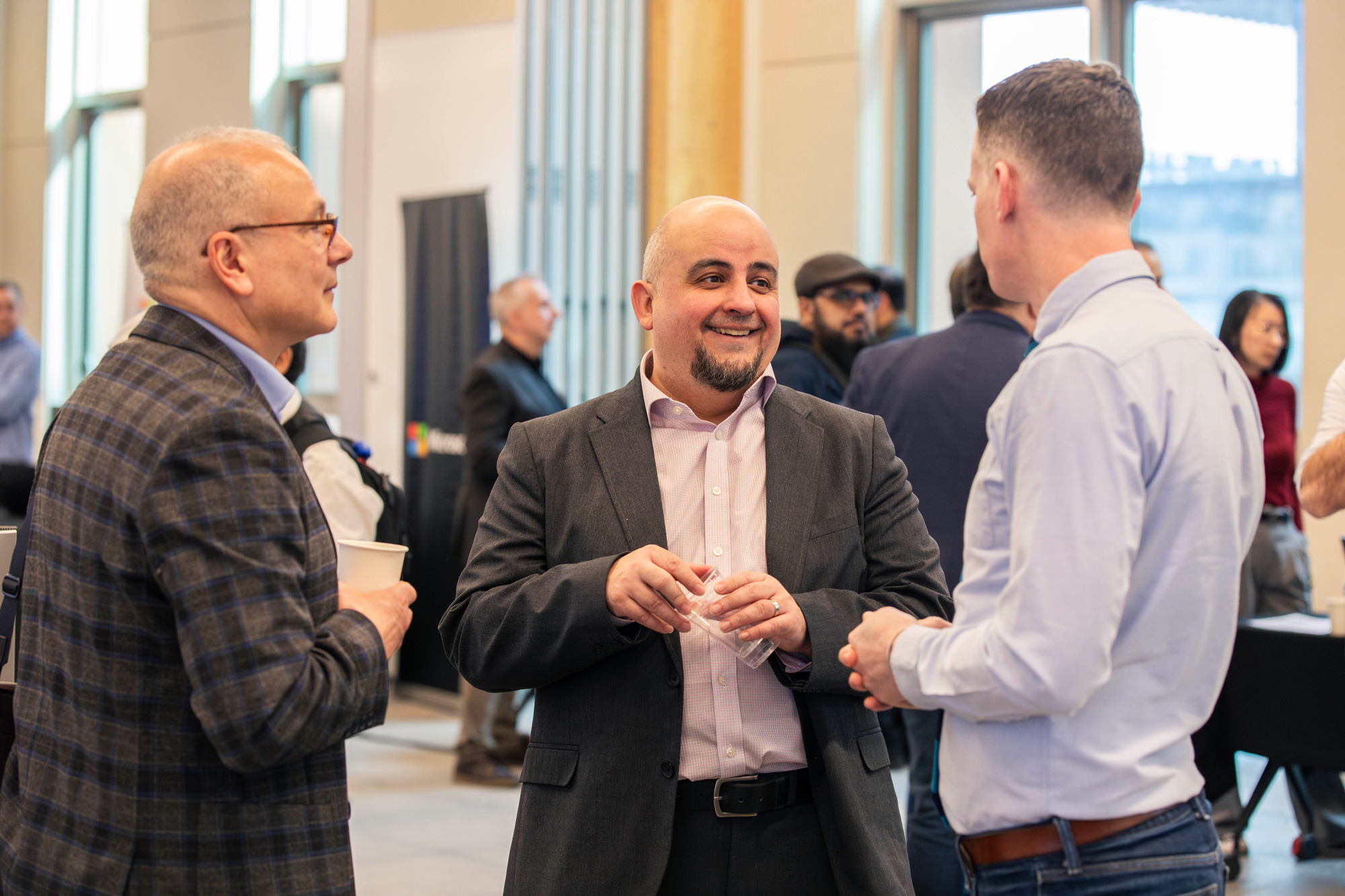 AI Innovation Showcase guests network with each other
