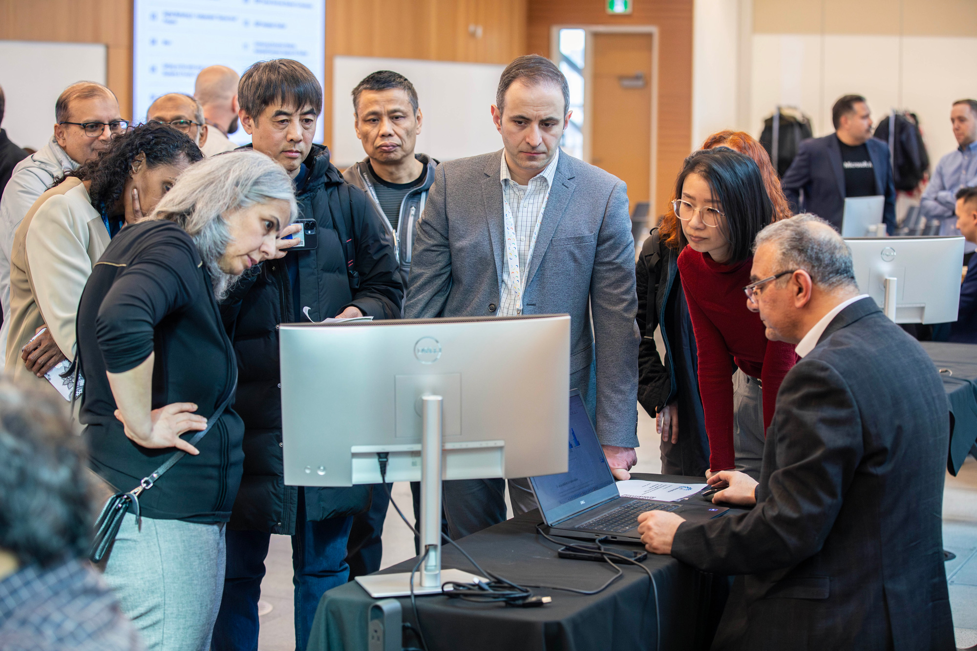 AI Innovation Showcase exhibitors share their creations with guests
