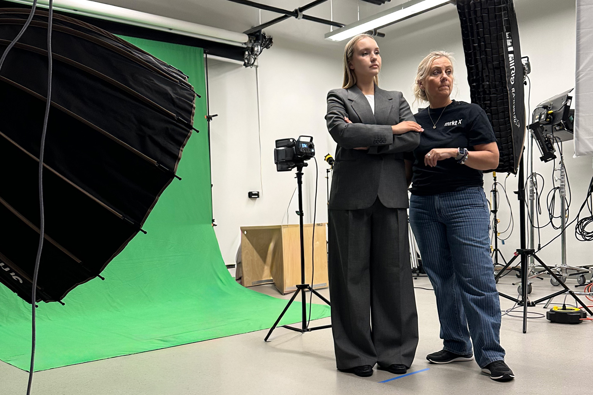 A behind the scenes look at a student posing for the new OWN campaign images