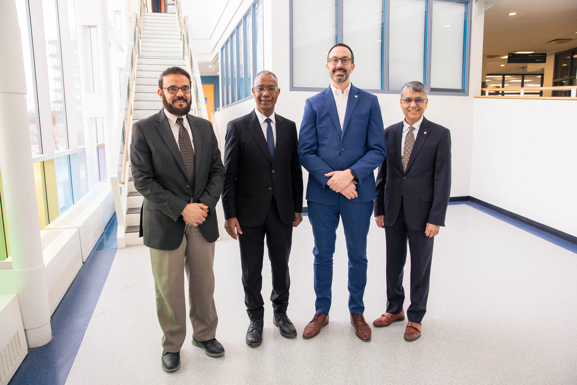 Dr. Adel Esay, Dr. Gervan Fearon, Minister Nolan Quinn, and Dr. Hassun Malik