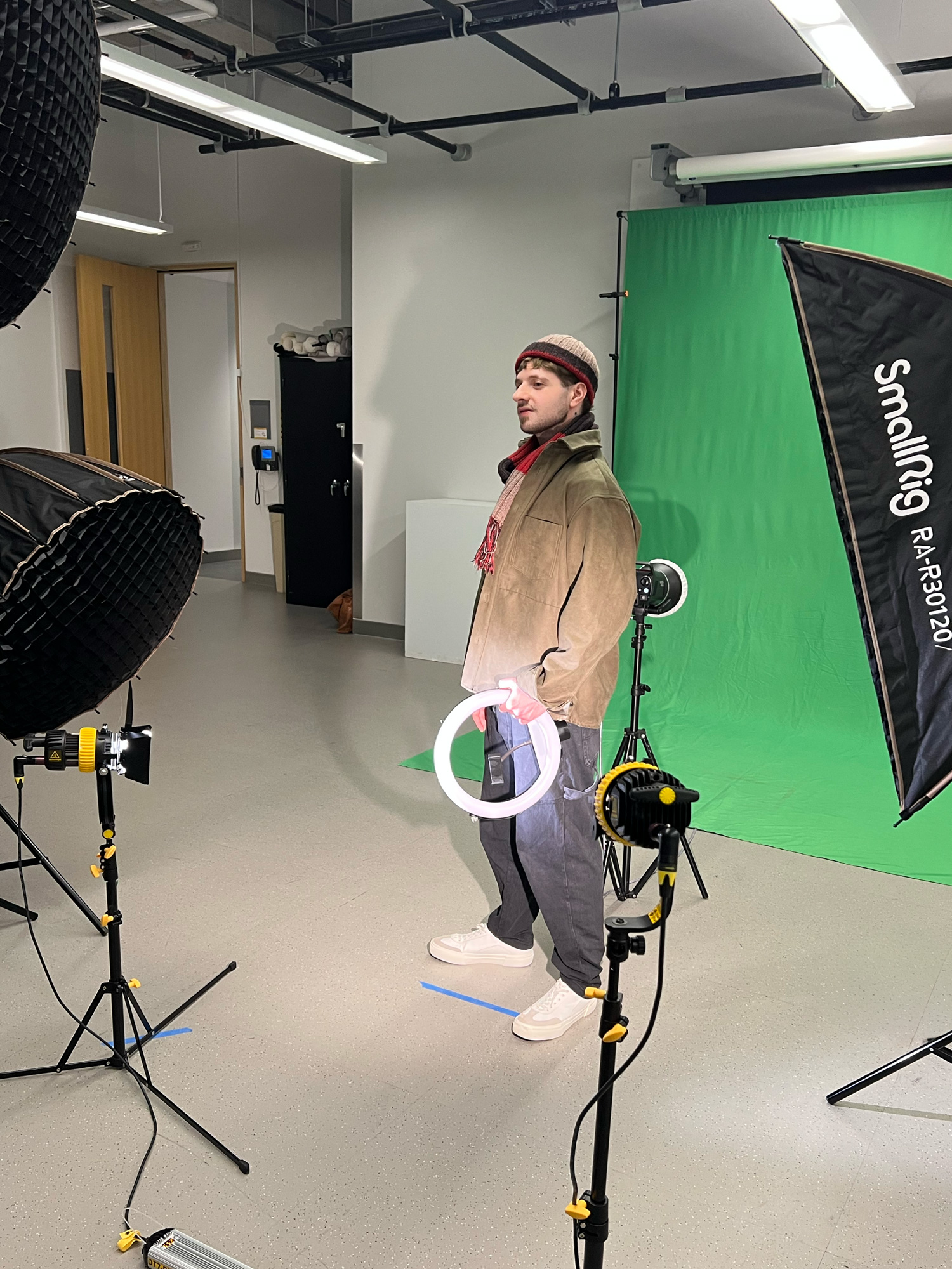 A behind the scenes look at a student posing for the new OWN campaign images