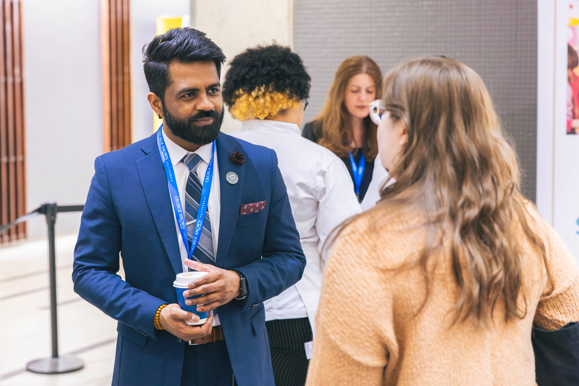 Students chat with employers at the career fair