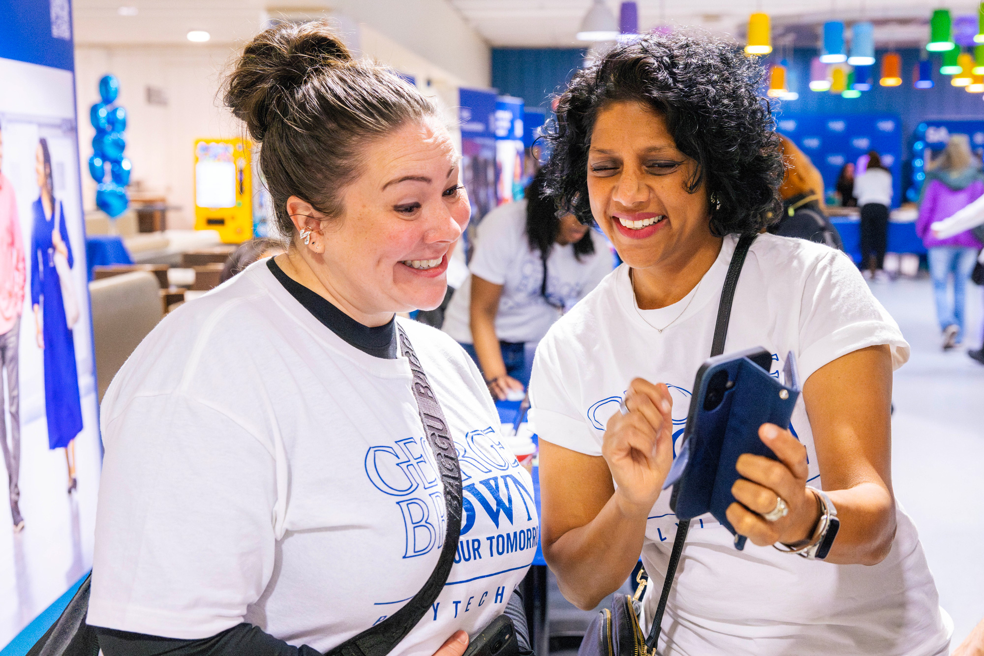 Staff give directions to prospective students at the spring open house