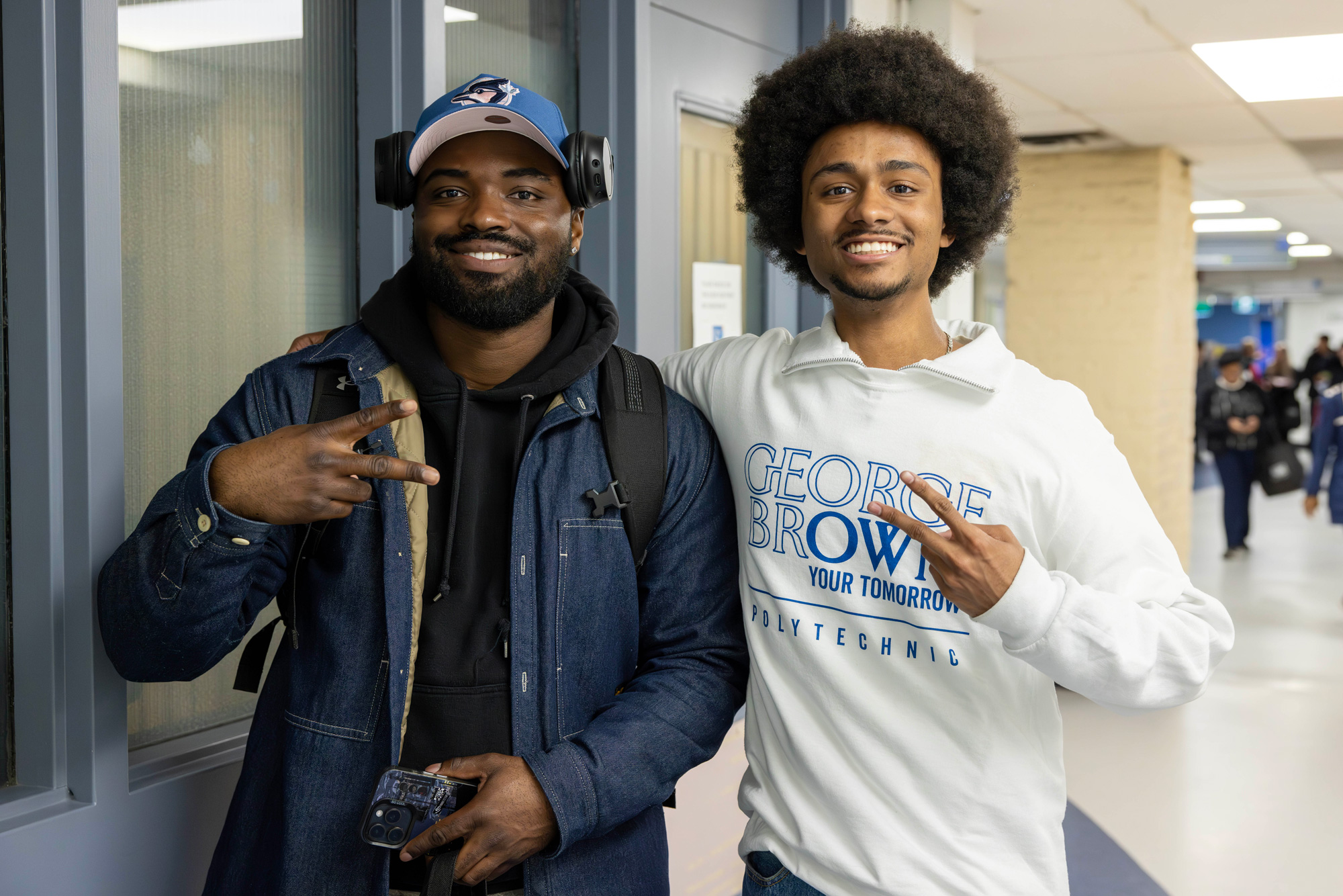 Volunteers connect with prospective students at the spring open house