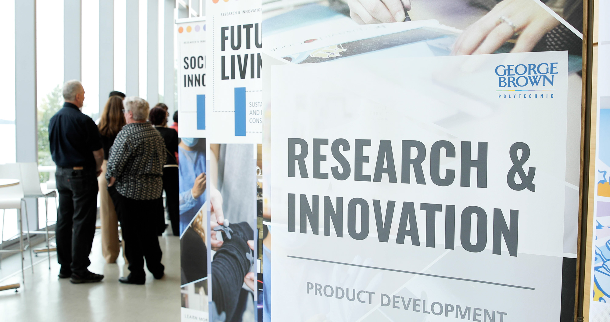 Research and Innovation banners lined up at showcase event