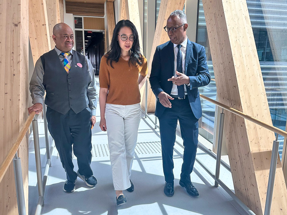 President Fearon and Michael Herrera tour Maggie Chi through Limberlost Place