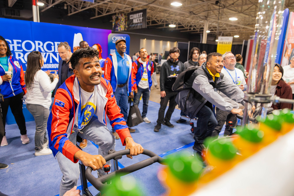 Guests engage with the plumbing activity at Skills Ontario