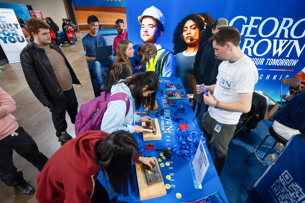 Students engage in hands on activities at the George Brown booth at Skills Ontario