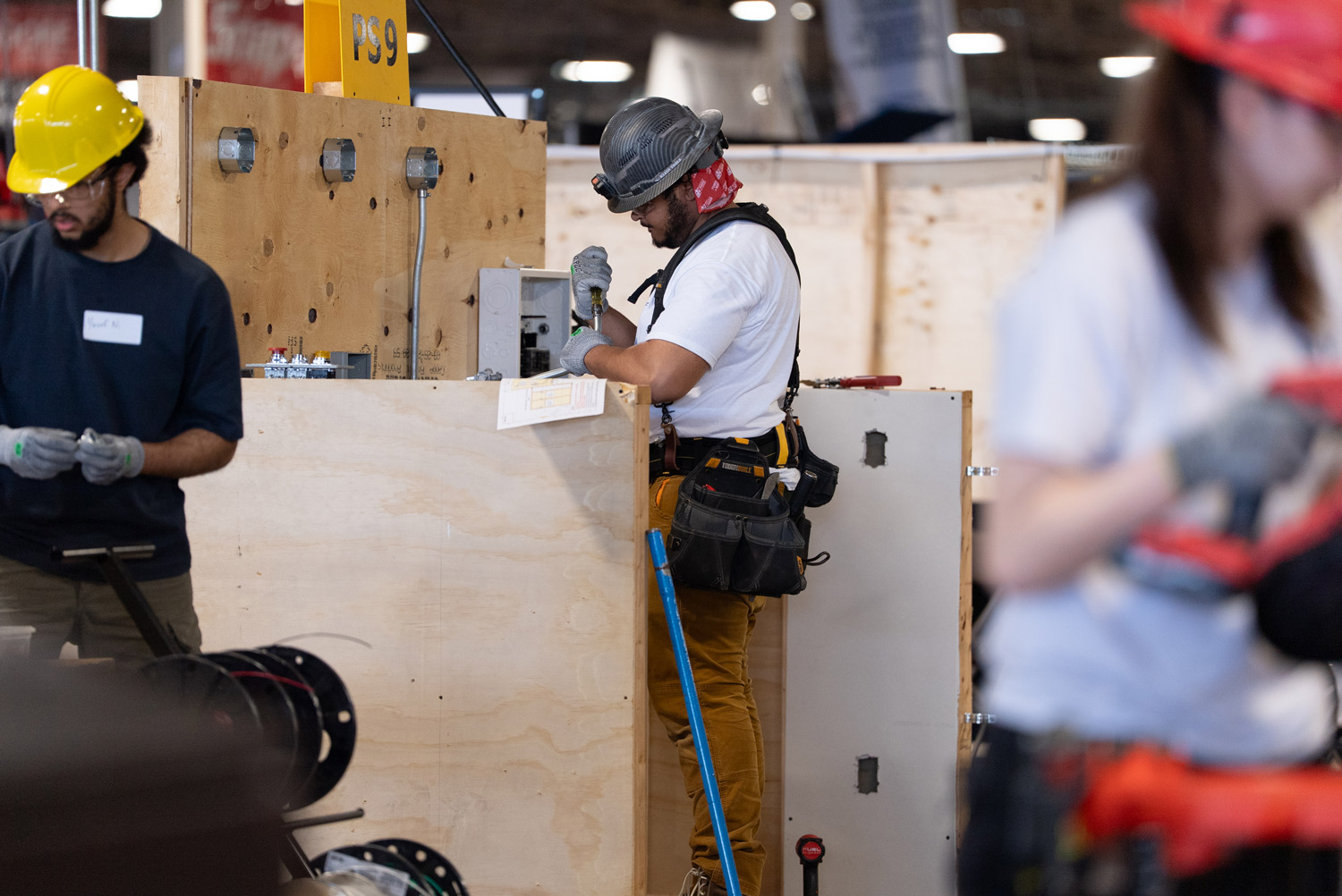 A George Brown student competes in the electrical category at the Skills Ontario competition.