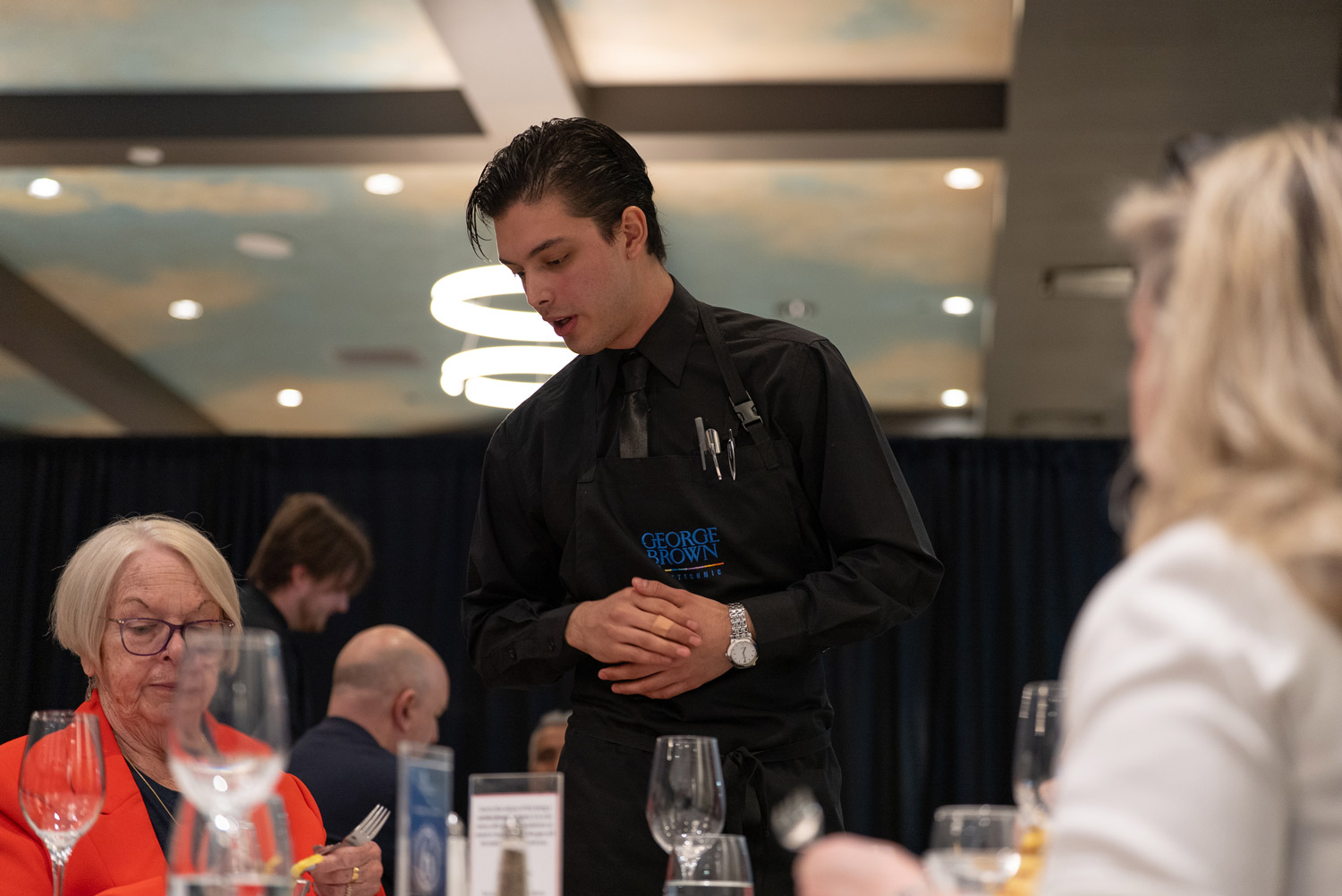 A George Brown student competes in the Culinary Service competition at Skills Ontario