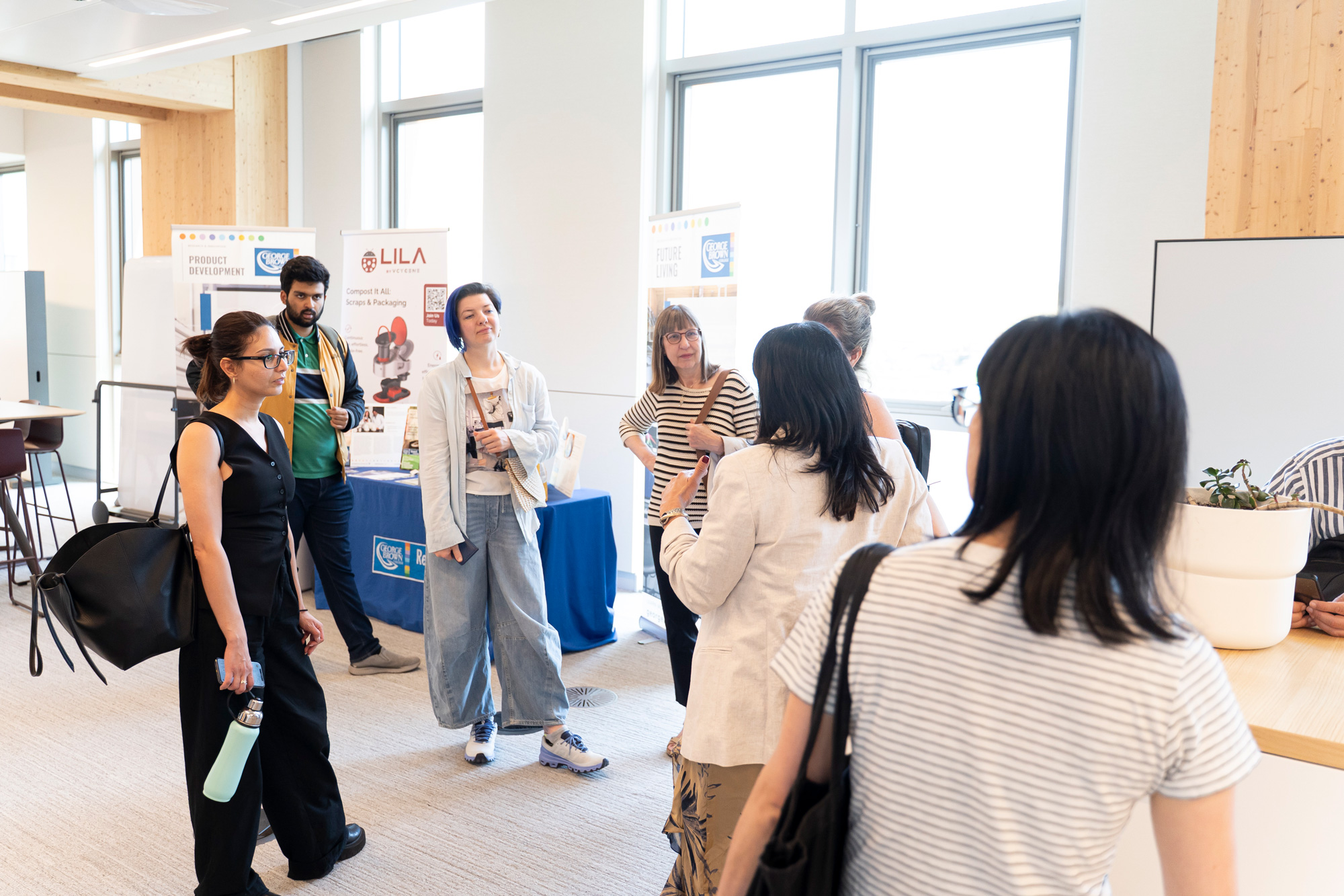 Visitors to Limberlost Place visit the Climate Week Sustainability Fair and engage with partners.