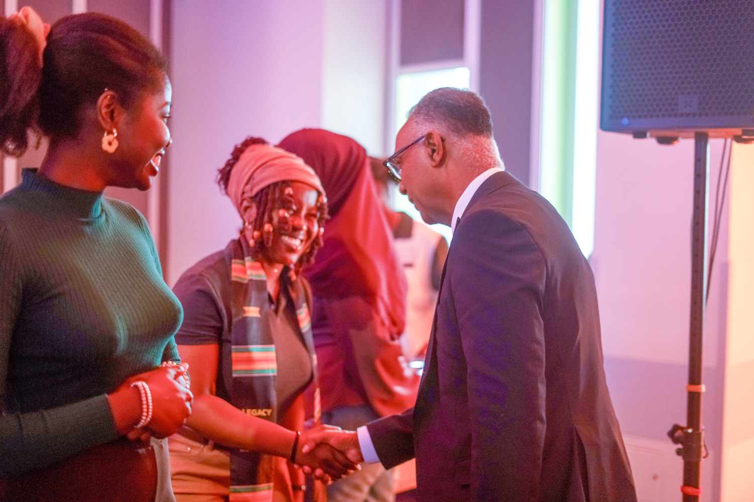 Dr. Fearon chats with new Black grads at the Legacy in the Making event.