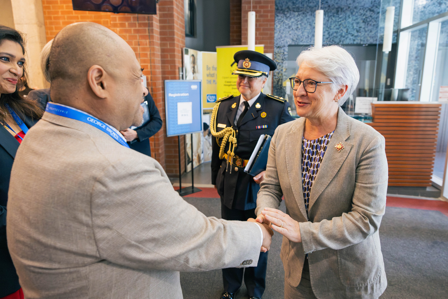 Lieutenant Governor Edith Dumont is greeted by Michael Herrera at the Ontario Wine Awards.