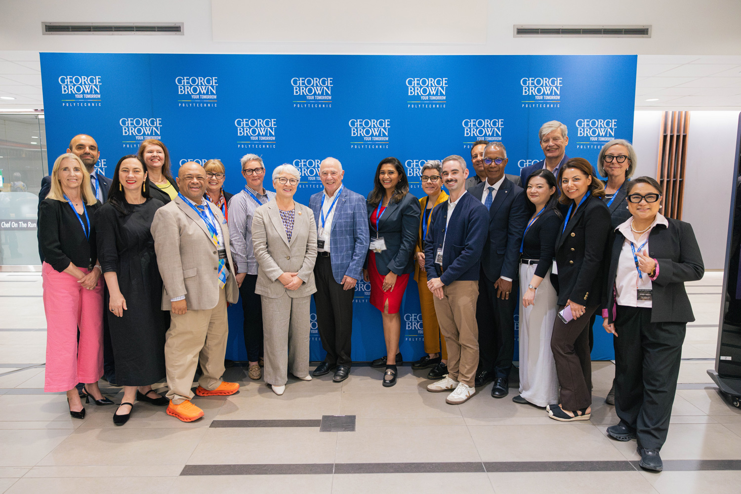 George Brown leadership and event organizers pose for a group photo in the Willaim Peyton Hubbard atrium at the Ontario Wine Awards.