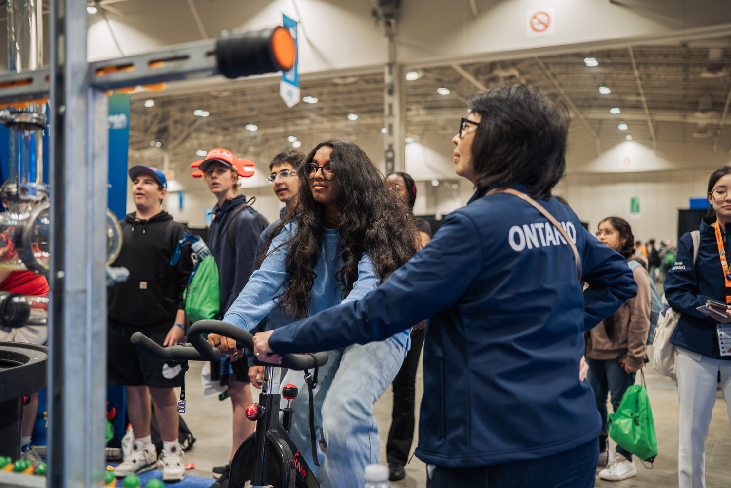 Students visit the plumbing activity at Skills Canada