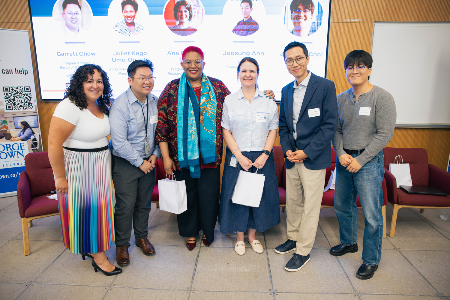 RISE showcase speakers pose for a photo following their panel.