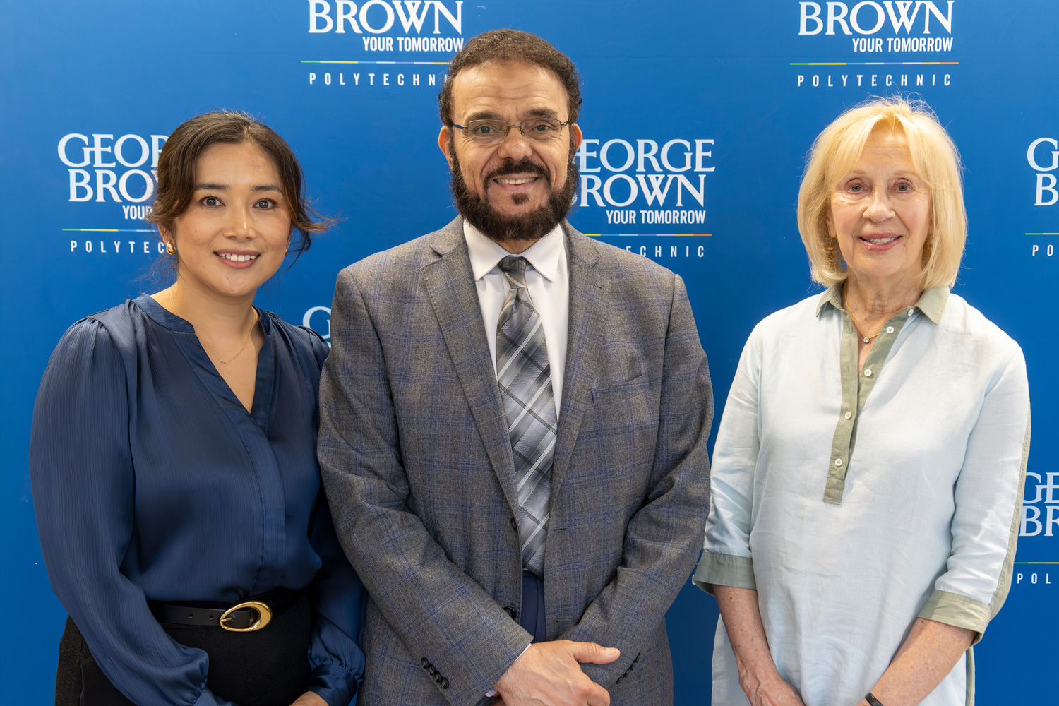 Marvi Ricker from the Gooder Foundation poses with Dean Esayed and Tenzin Noryang from George Brown's Foundation team.