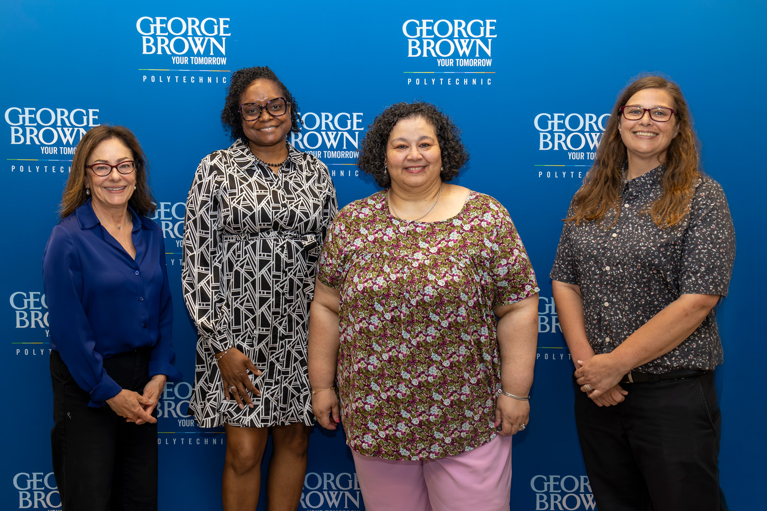 Dean Toews and the College Vocational team pose together for a photo following the receipt of a gift from the Gooder Foundation supporting their program.