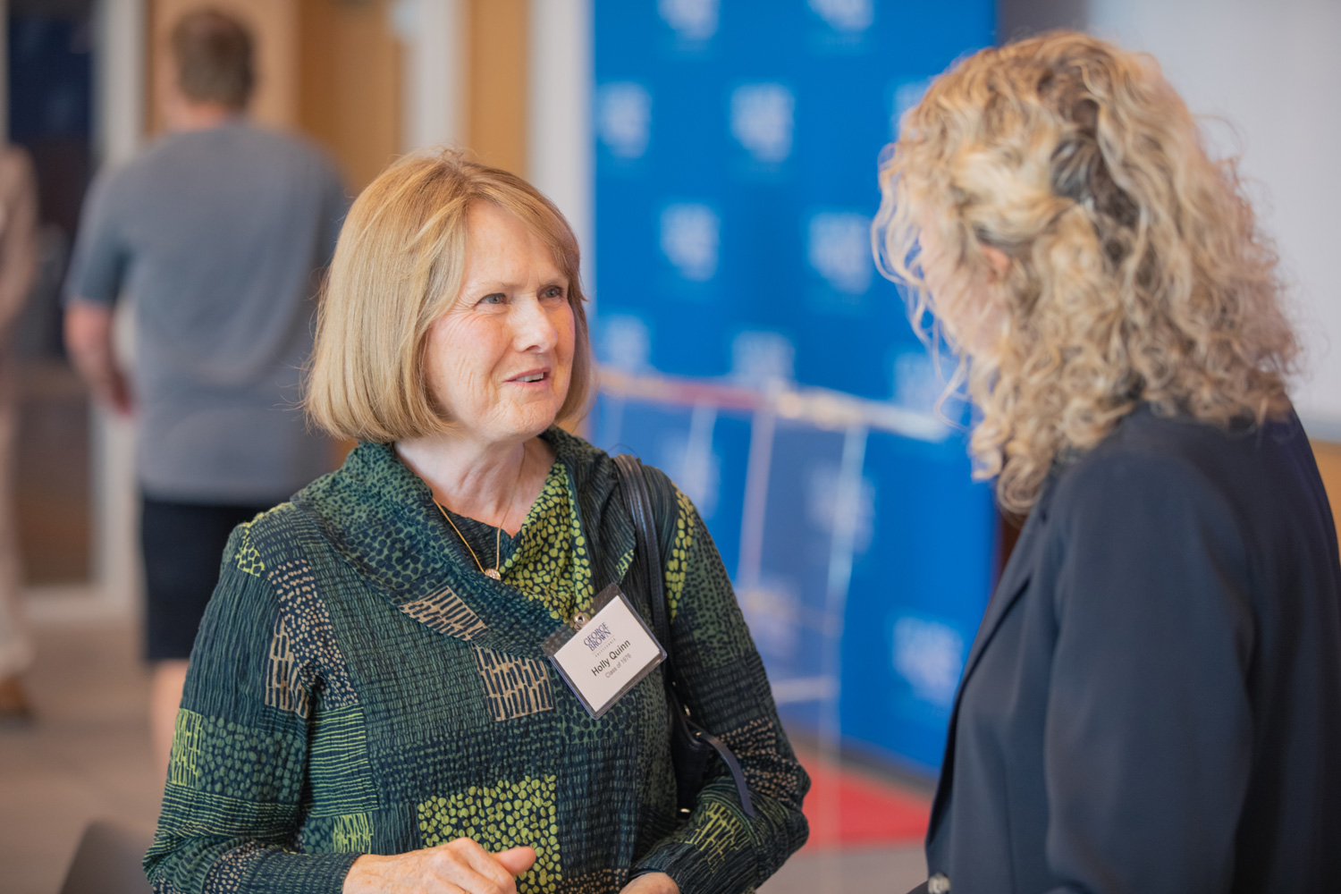 A nursing graduate speaks to George Brown's alumni team at the 50th reunion event at George Brown.l