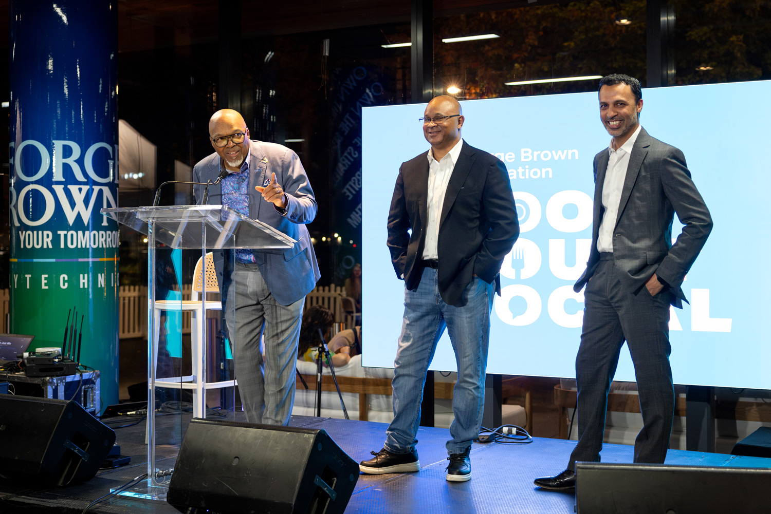 Food Court Social co-chairs take the stage to welcome guests.