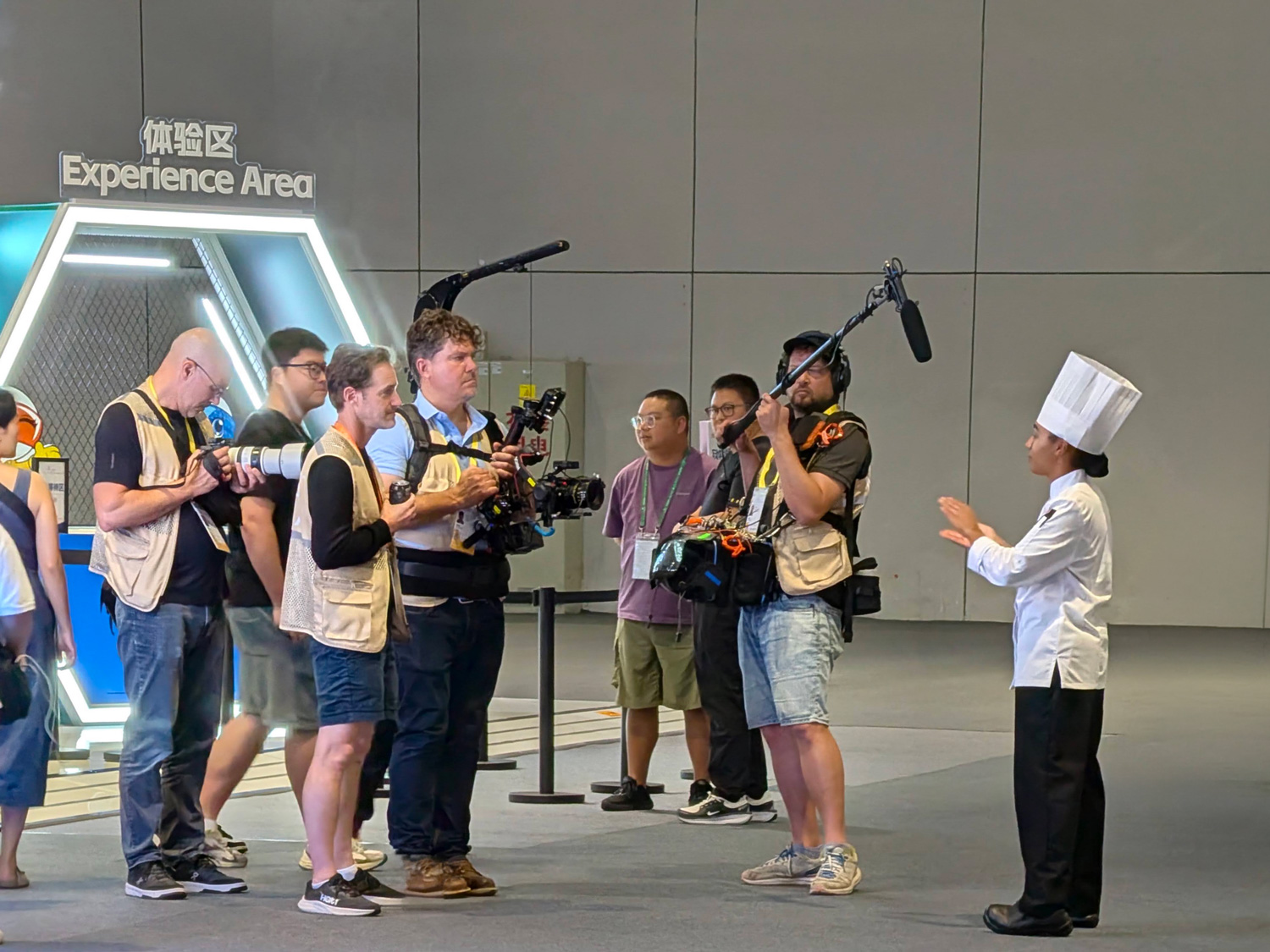 Luca speaks to a group of media at the WorldSkills competition in Shanghai.