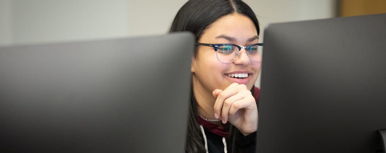 Student using a desktop computer