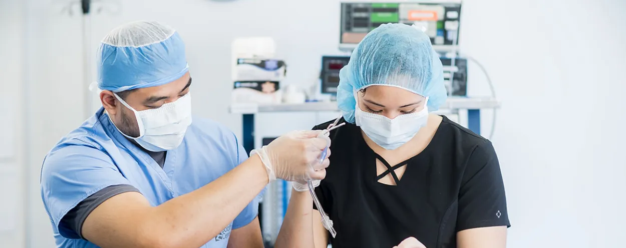 2 students working in health sciences simulation centre