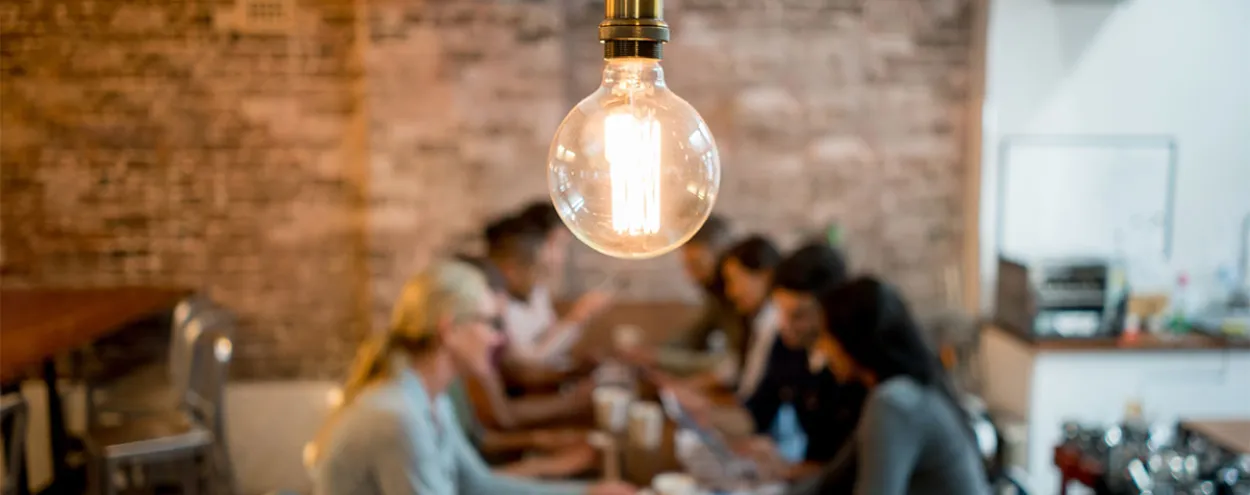 A group of people sitting at a table